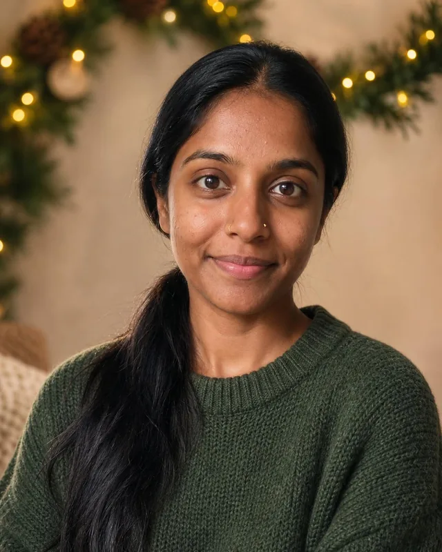 AI Christmas photo: woman in a green knit sweater against a cream backdrop with pine garland
