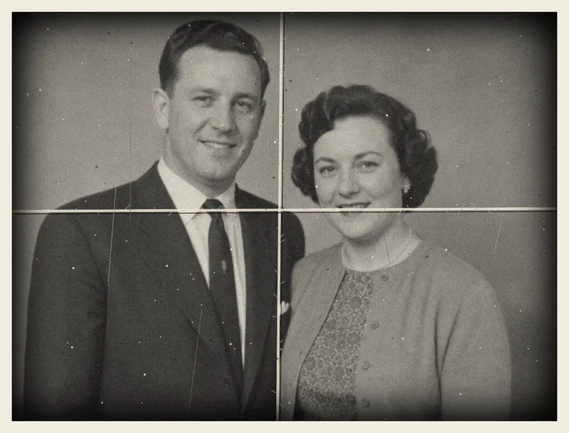 Old photo before restoration: damaged old black-and-white portrait of a couple: folded in four with cracked creases
